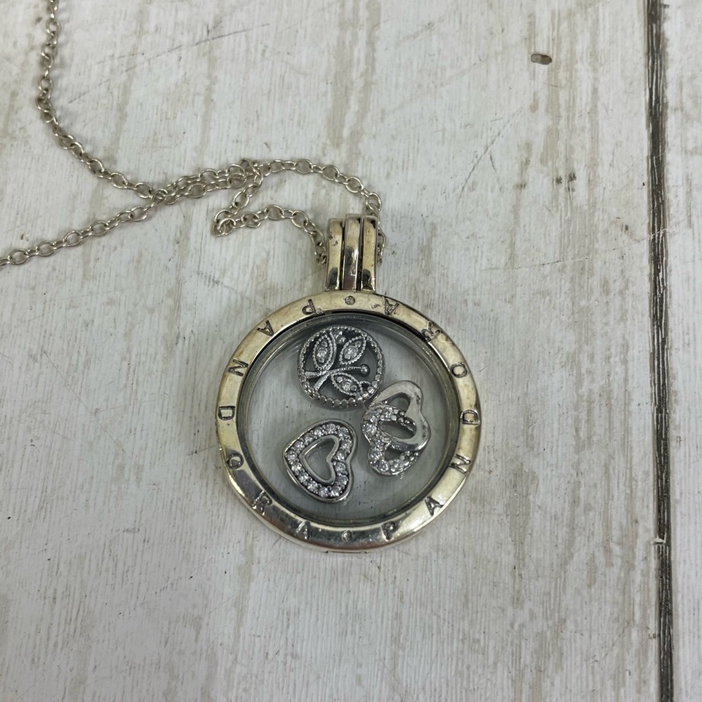 Genuine Pandora floating locket necklace with three charms
